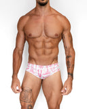 BORNEO Atlantic Pink swimsuit for men with a pink and white floral print, front view