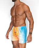 Short de baño Glitter de BORNEO con degradado de azul celeste a naranja, vista lateral