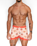 Short de baño Tayrona de BORNEO con estampado geométrico en coral y crema, vista frontal