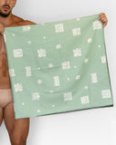 BORNEO Caribe beach towel, sage green side with tropical motifs